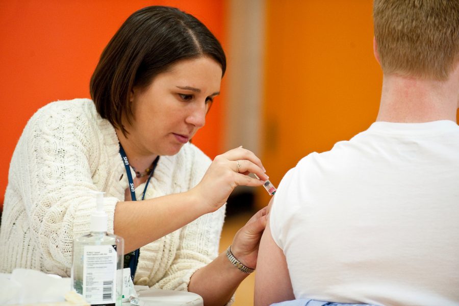 Student receiving flu vaccine