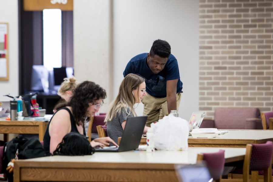 uw madison students studying in merit library