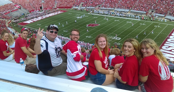 Students from Mansfield Hall's Madison location build community and enjoy the full college experience by attending a Badgers football game at Camp Randall Stadium.