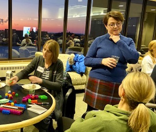 CRECE Director Beth Graue, who wants to help build a "supportive community" for area teachers, talks with a workshop attendee.